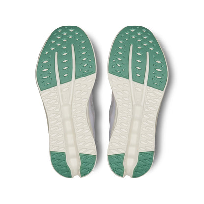 Soles of the On Cloudsurfer 7 Pearl-Ivory women’s running shoes 