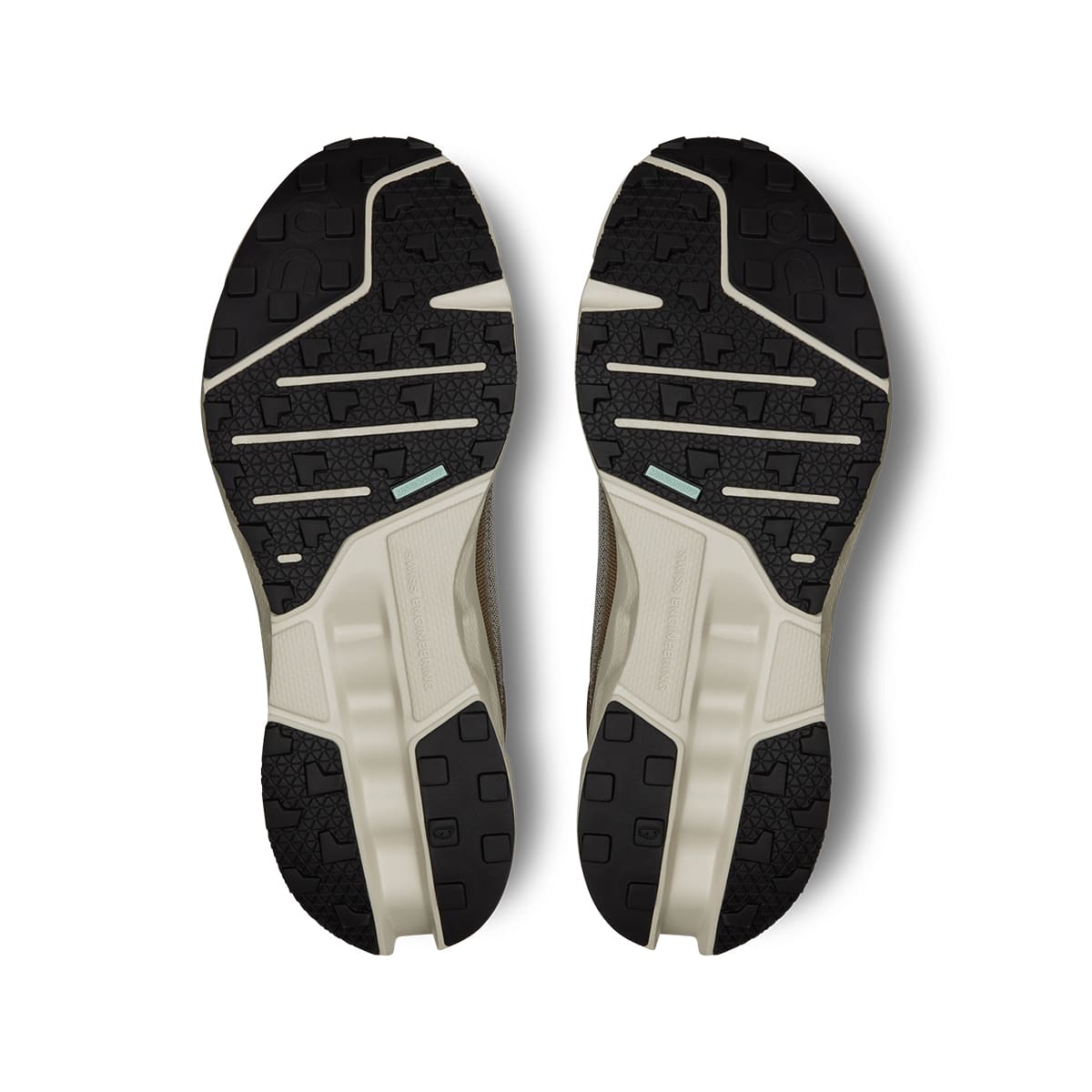 Soles of the On Cloudsurfer Hunter Ice men’s running shoes #color_hunter-ice