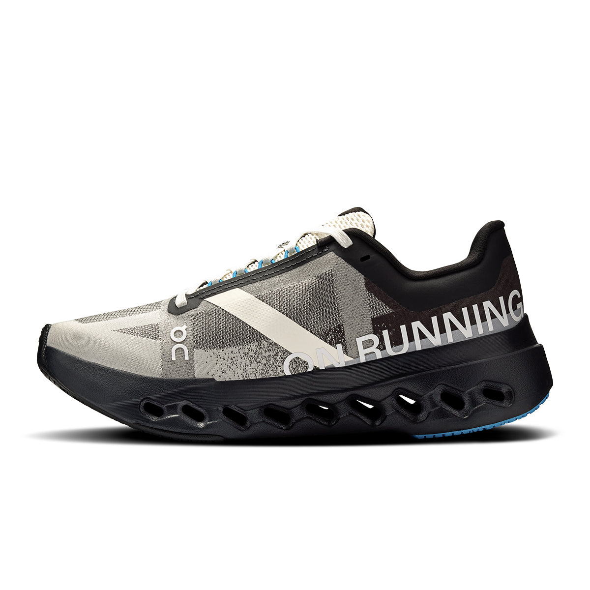 Left side view of the Road Running On Cloudsurfer Next Lumos Black-Dew men’s running shoe #color_black-dew