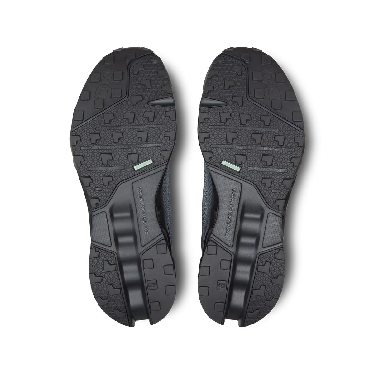 Soles of the On Cloudsurfer Trail Eclipse Black women’s running shoes #color_eclipse-black