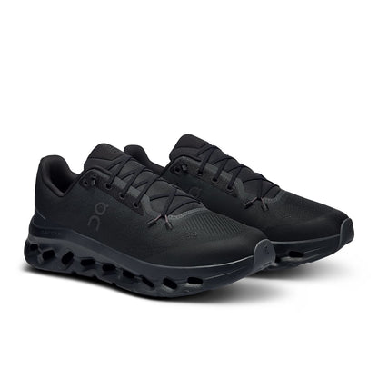 Soles of the On Cloudtilt Eclipse-Black men’s running shoes 