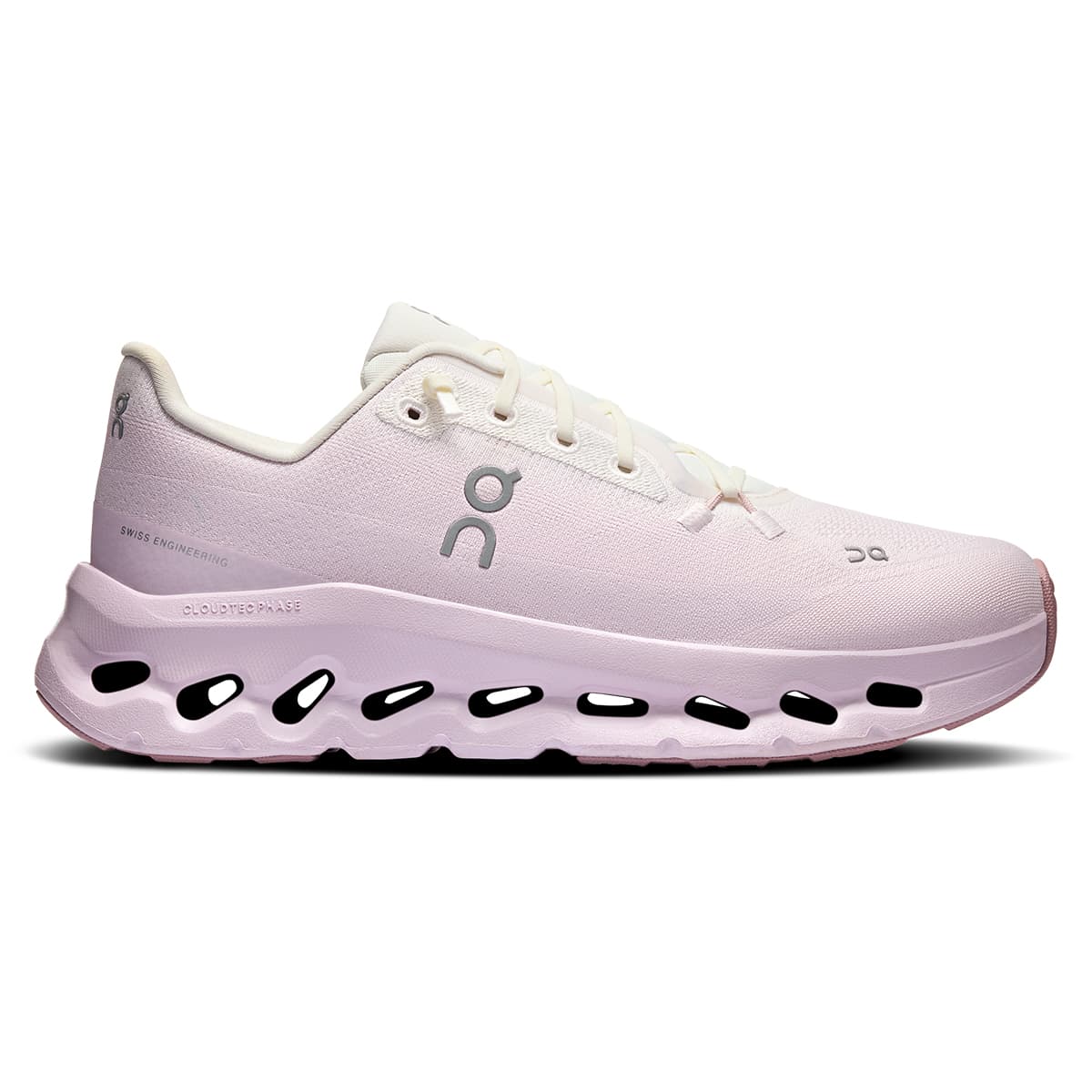 Right side view of the On Cloudtilt Ivory Orchid women’s running shoe 