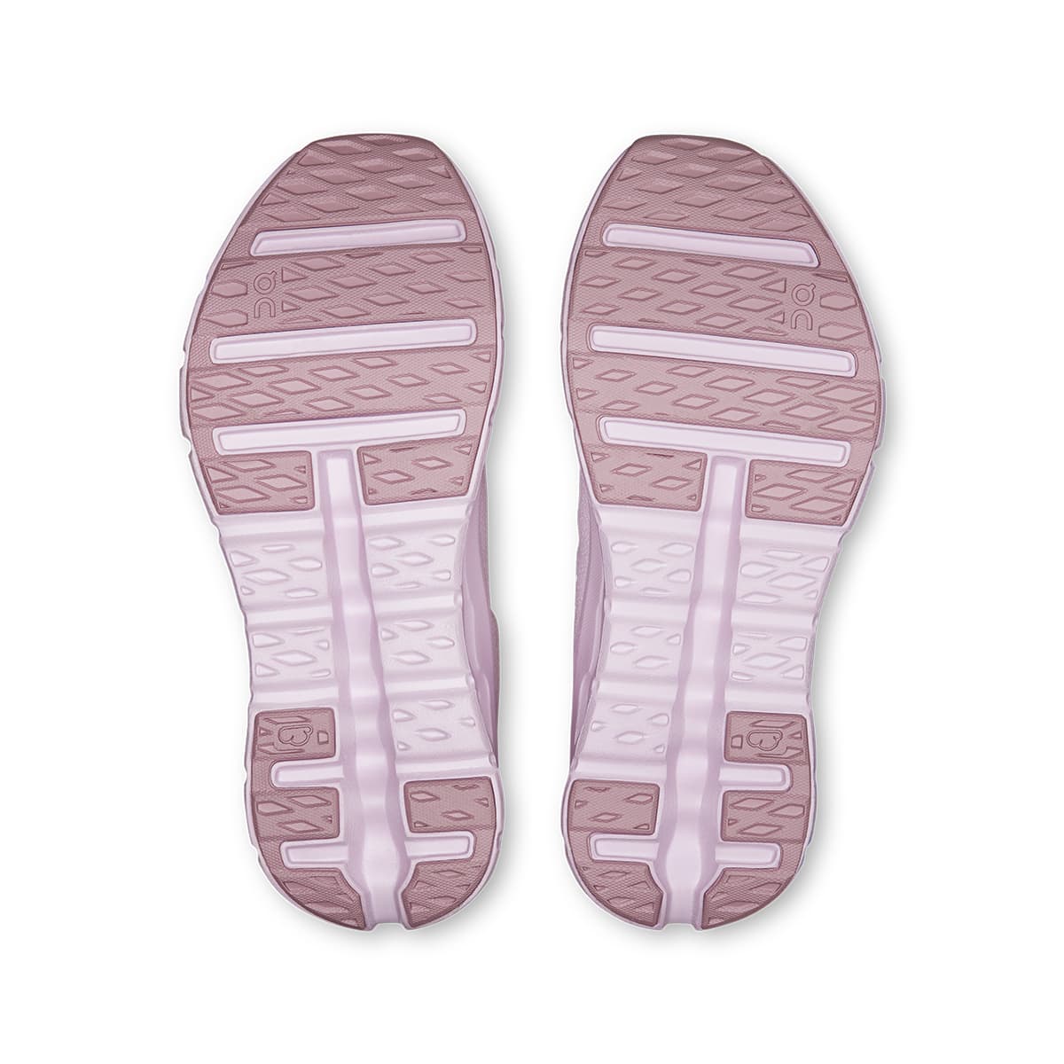 Soles of the On Cloudtilt Ivory Orchid women’s running shoes 
