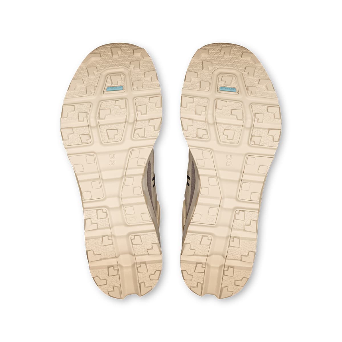 Soles of the On Cloudvista 2 Cream Desert women’s running shoes #color_cream-desert