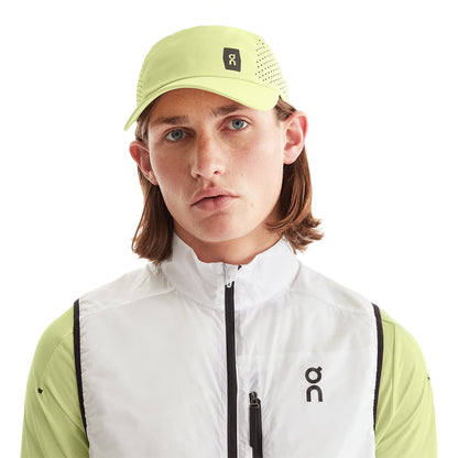 Male Model wearing the On Lightweight Cap Colour Hay - Front View 