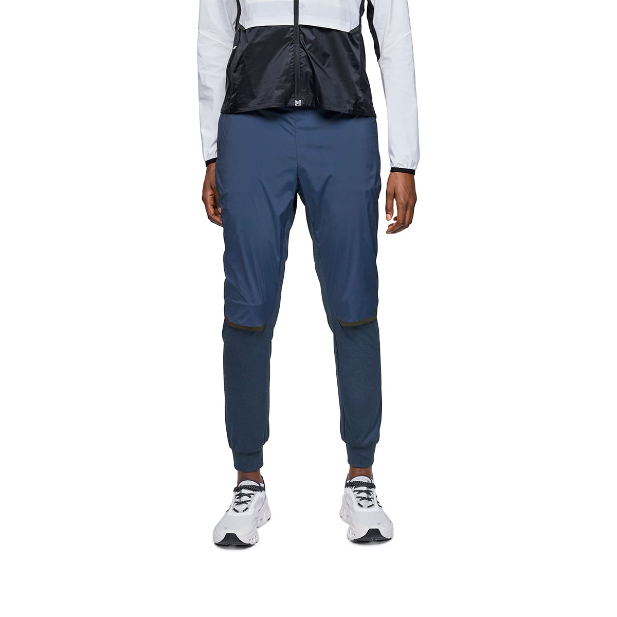 Woman wearing the On Weather Pants Colour Denim Navy - Front Fit 