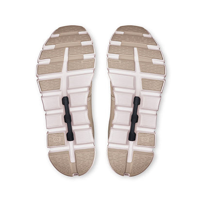 Soles of the On Cloud 6 Pearl-White women’s running shoes 