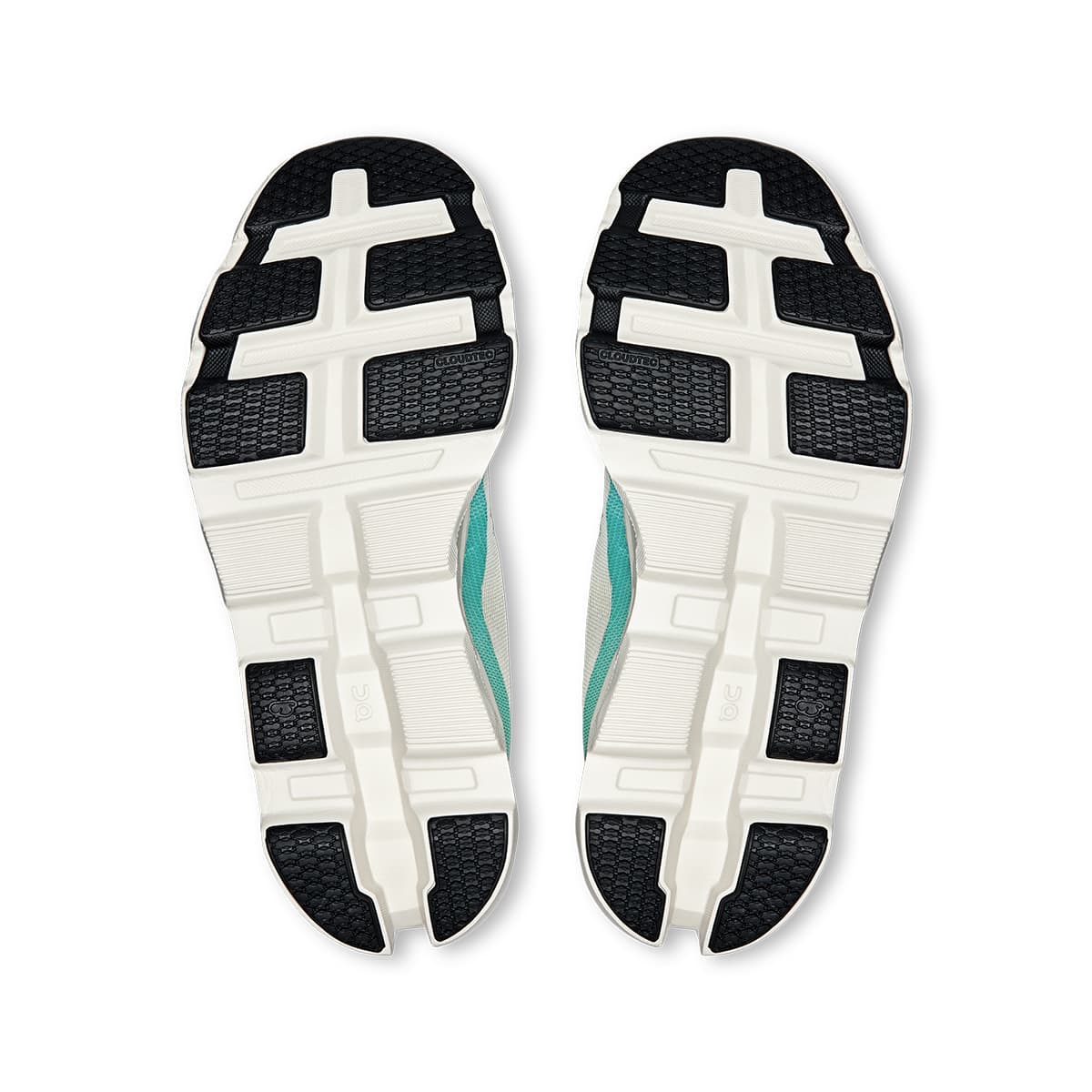 Soles of the On Cloudmonster 2 Cream Horizon women’s running shoes 