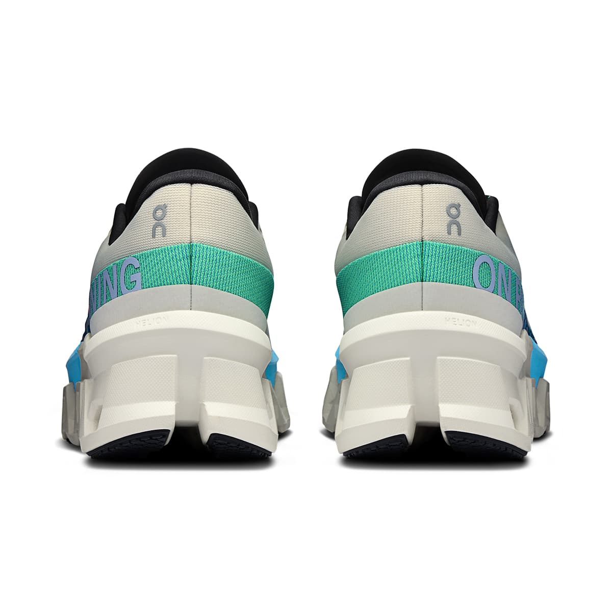Back view of the On Cloudmonster 2 Cream Horizon women’s running shoe 