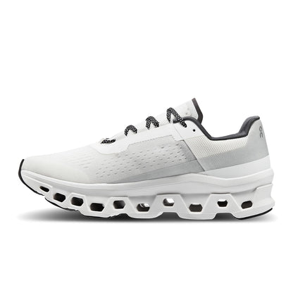 Left side view of the On Cloudmonster All White women’s running shoe 