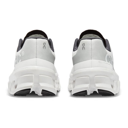 Back view of the On Cloudmonster All White women’s running shoe 