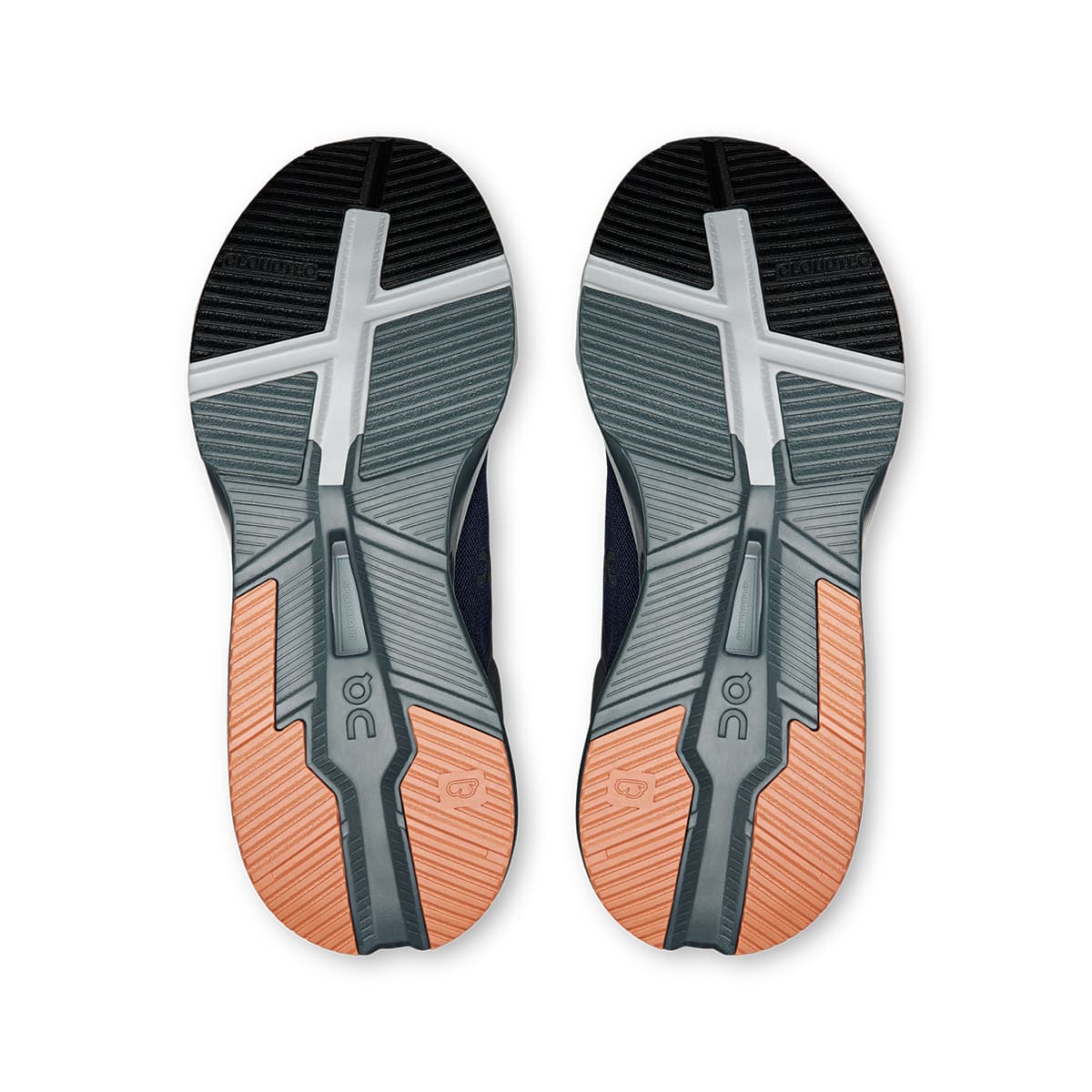 Soles of the On Cloudnova X Ink Canyon men’s running shoes #color_ink-canyon