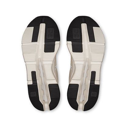 Soles of the On Cloudnoa Form 2 TT Cream-Ivory women’s running shoes 