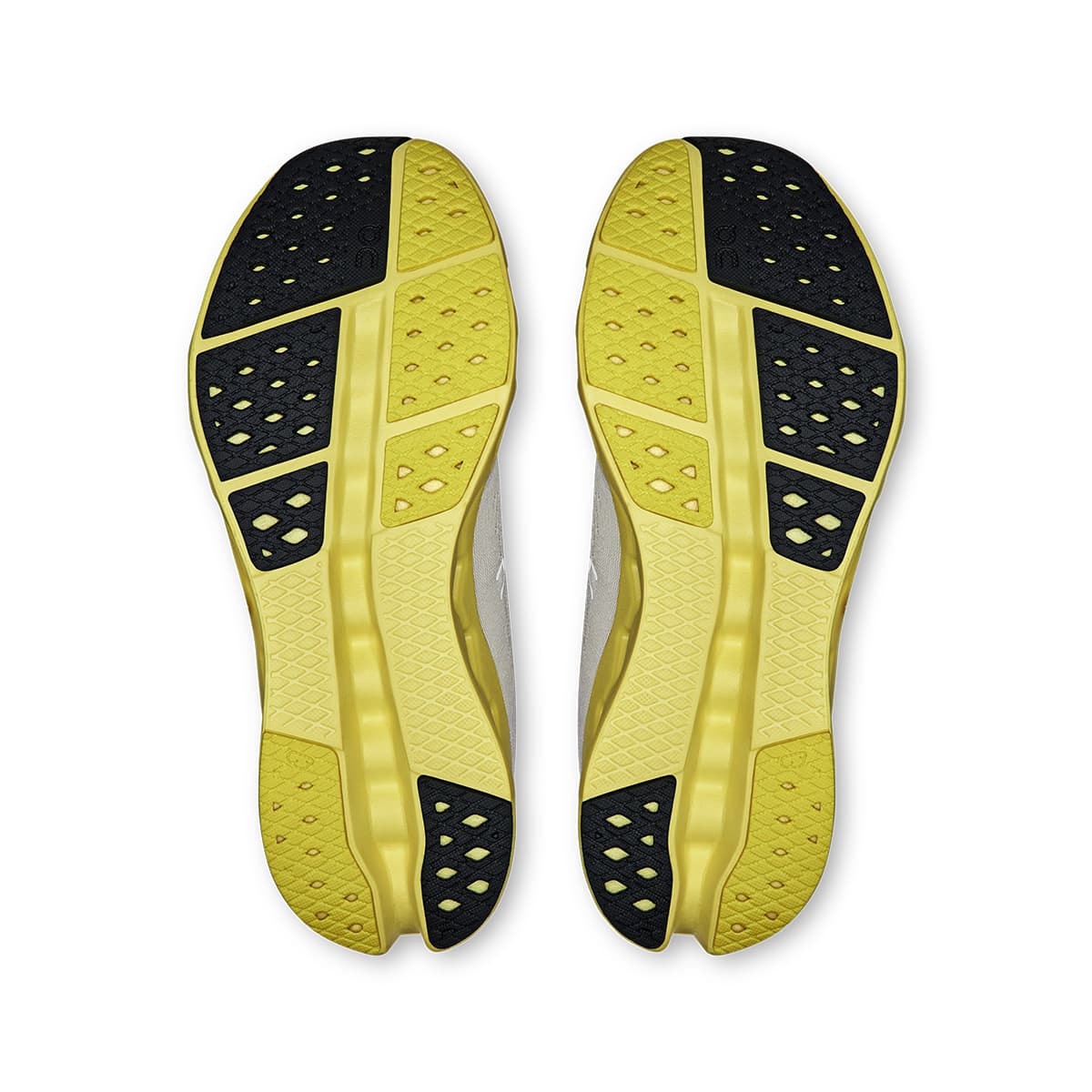 Soles of the On Cloudsurfer 2 Glacier Limelight women’s running shoes #color_glacier-limelight