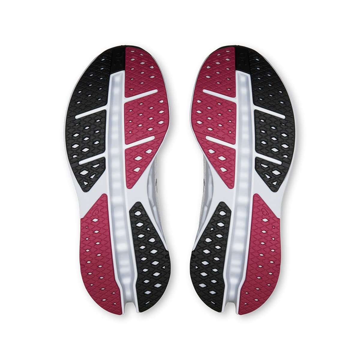 Soles of the On Cloudsurfer Max Ivory-Arctic women’s running shoes 