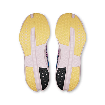 Soles of the On Cloudsurfer Next Malibu-Raspberry women’s running shoes 