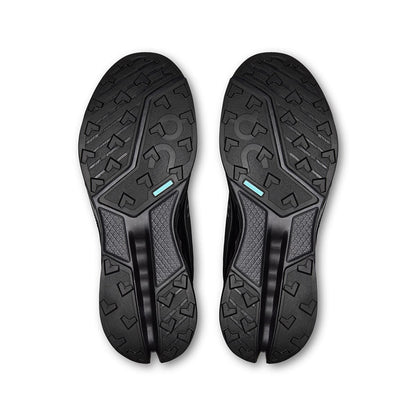 Soles of the On Cloudsurfer 2 Trail Black-Eclipse men’s running shoes 