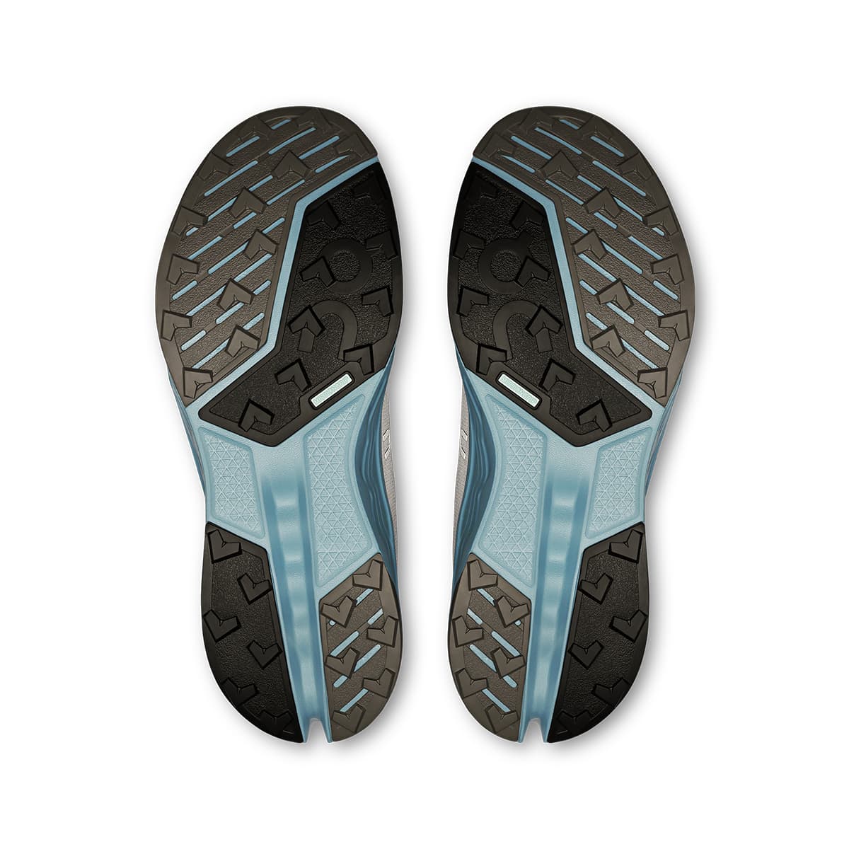 Soles of the On Cloudsurfer 2 Trail Glacier-Dust women’s running shoes #color_glacier-dust