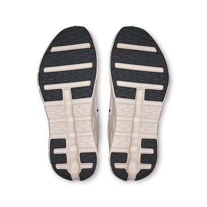 Soles of the On Cloudtilt Rock Ivory men’s running shoes 
