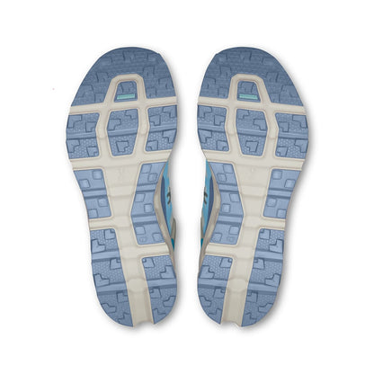 Soles of the On Cloudvista 2 Cream-Horizon women’s running shoes 
