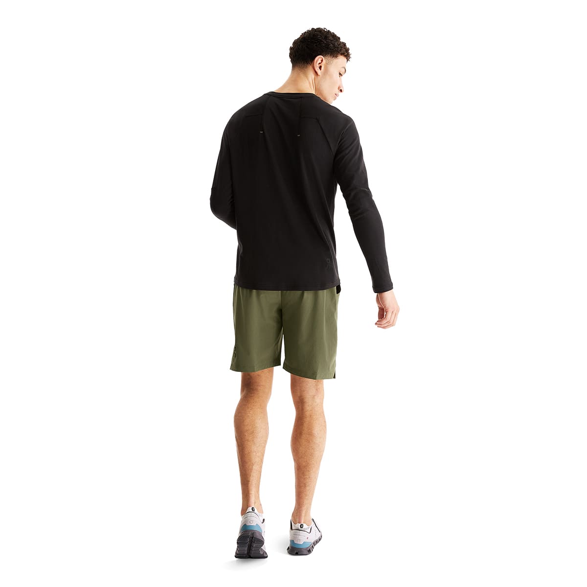 Man wearing the On Focus Long T Colour Black - Back View #color_black