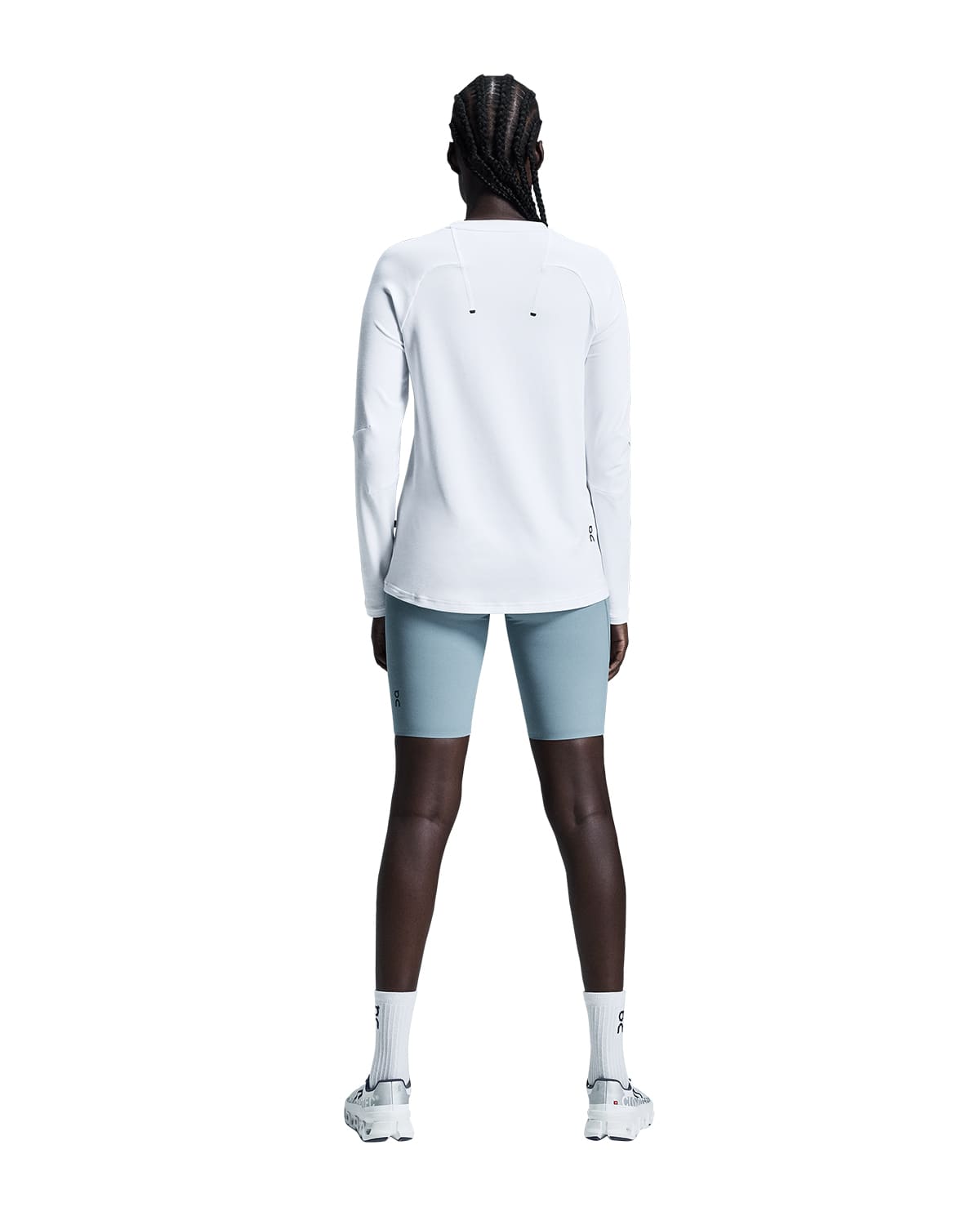 Women wearing the On Focus Long T Colour White - Back View #color_white