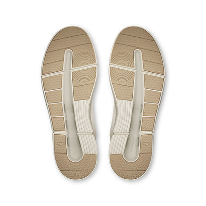 Soles of the On The Roger Advantage 2 White-Sand men’s running shoes 