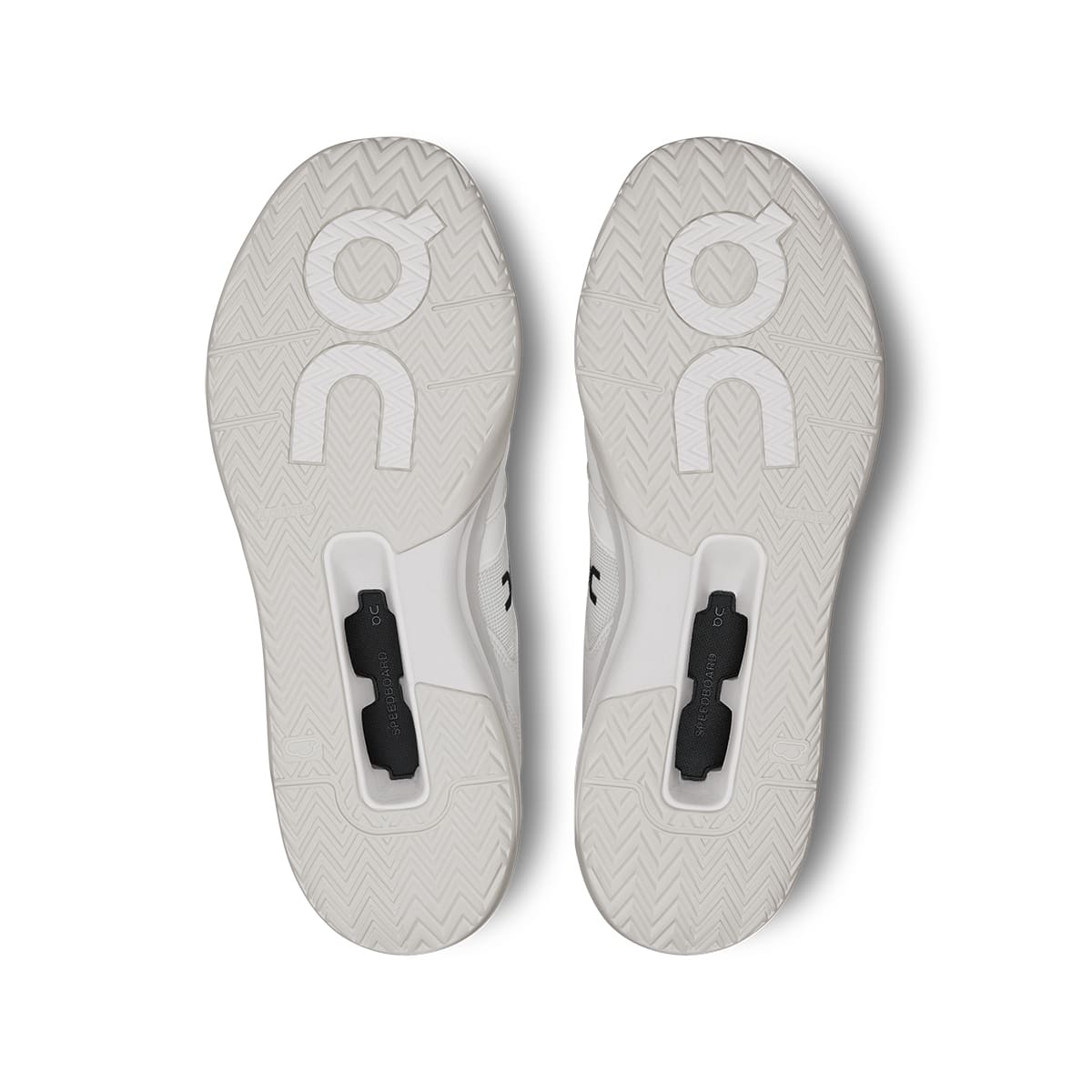 Soles of the On The Roger Clubhouse Pro White Ice men’s running shoes #color_white-ice