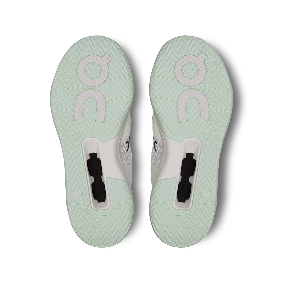 Soles of the On The Roger Pro White Lima women’s running shoes #color_white-lima