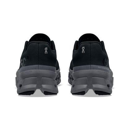 Back view of the On Cloudmonster Black Magnet women's running shoe 