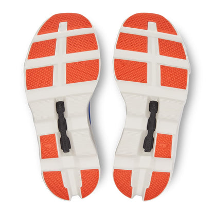 Soles of the On Cloudmonster Frost Cobalt women's running shoes 