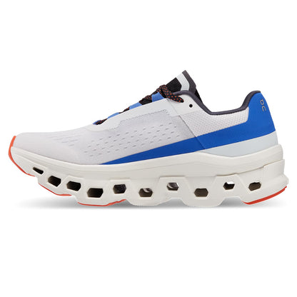 Left side view of the On Cloudmonster Frost Cobalt women's running shoe 