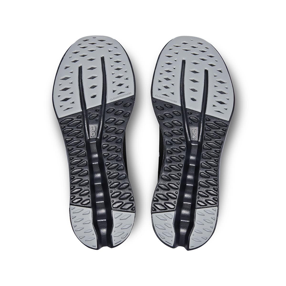 Soles of the On Cloudsurfer 7 All-Black men’s running shoes 