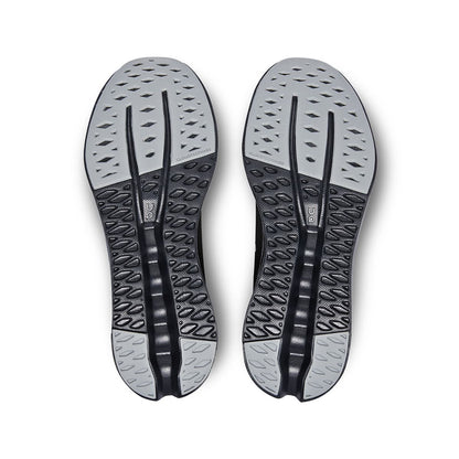 Soles of the On Cloudsurfer 7 All-Black men’s running shoes 