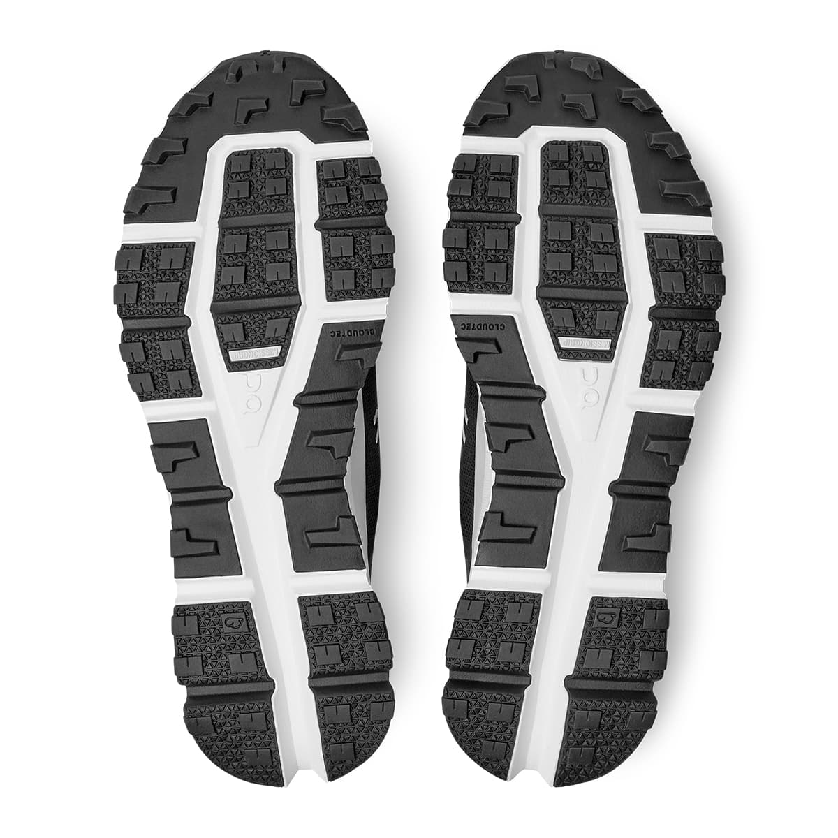 Soles of the On Cloudultra Black White running shoes 