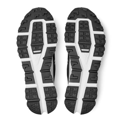 Soles of the On Cloudultra Black White running shoes 