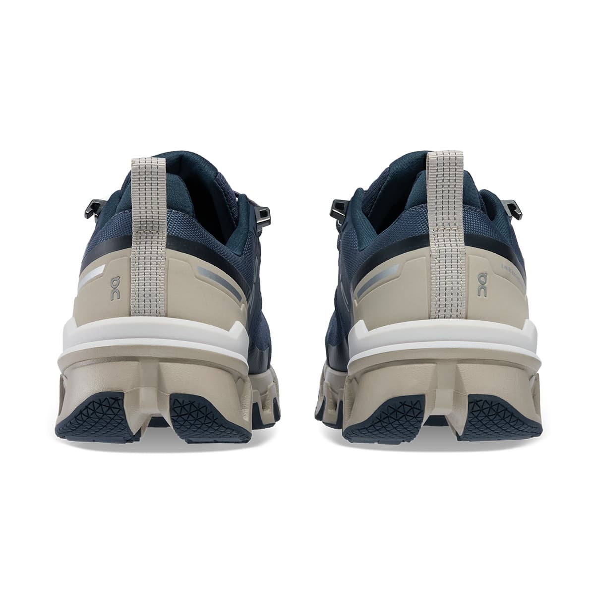 Back view of the On Cloudwander Waterproof Navy-Desert women’s running shoe 
