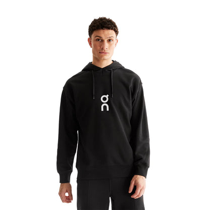 Man wearing the On Club Hoodie Colour Black 