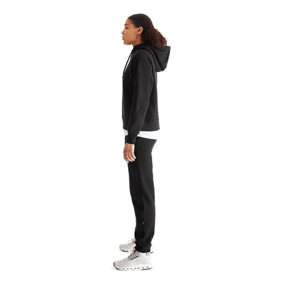 Women wearing the On Club Hoodie Colour Black - Side Profile 
