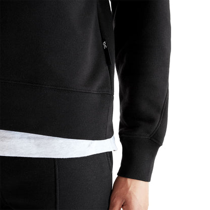 Women wearing the On Club Hoodie Colour Black - Zoom front Logo Tag 