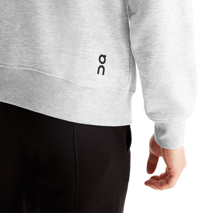 Man wearing the On Club Hoodie Colour Crater - Close up back logo 