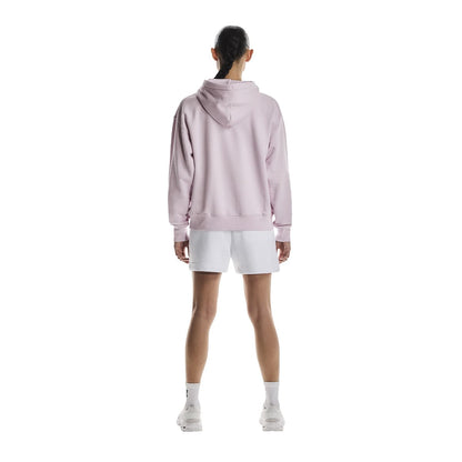 Full back view of female model wearing the On Club Hoodie in Orchid 