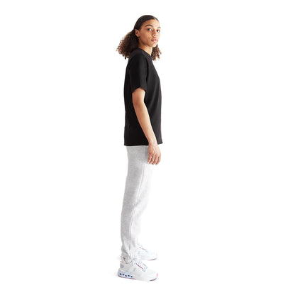 Women wearing the On Club T Colour Black- Side Profile 