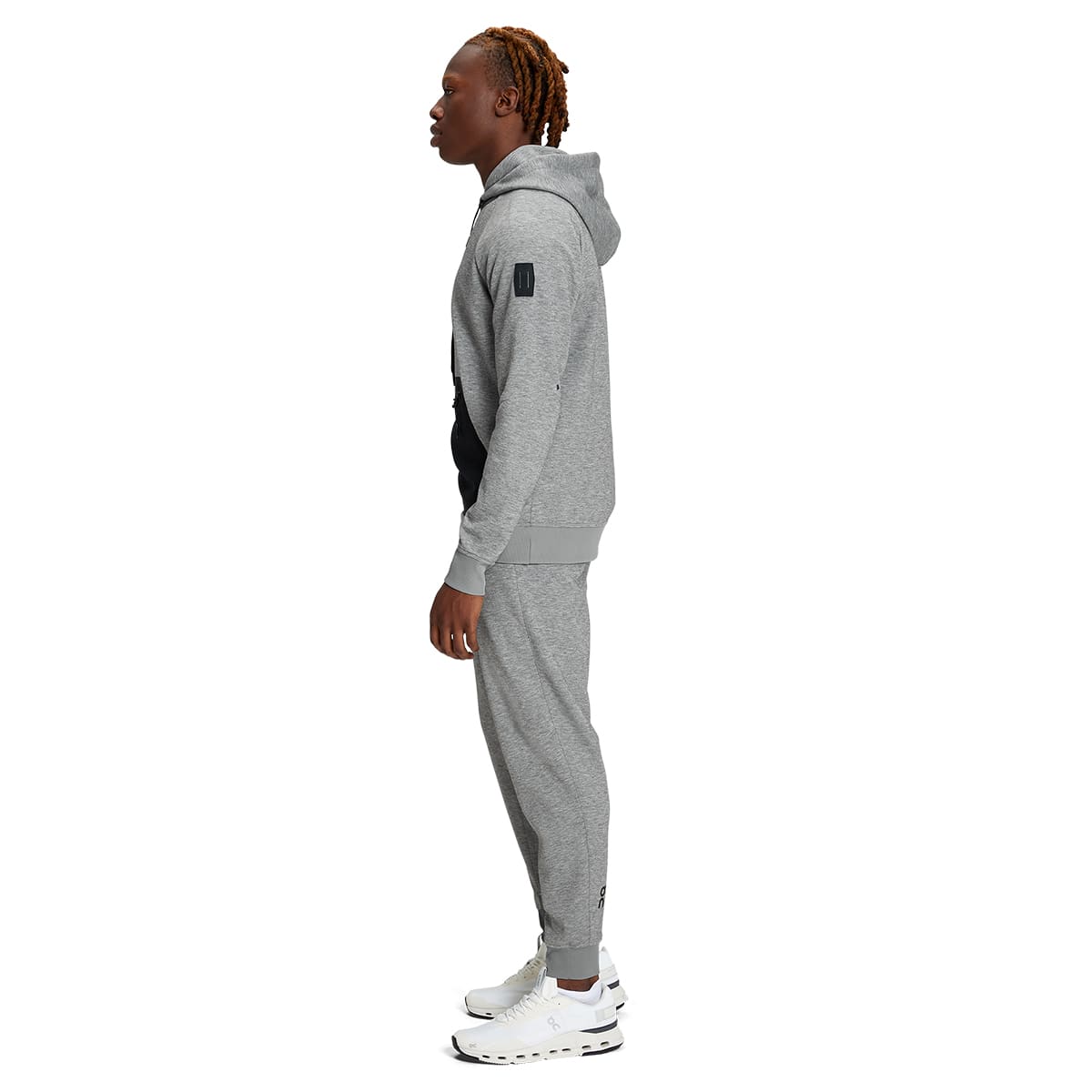 Man wearing the On Hoodie Colour Grey - Side View #color_grey