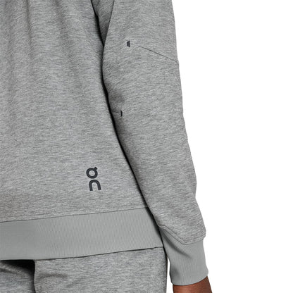 Man wearing the On Hoodie Colour Grey - Detail Back Logo 