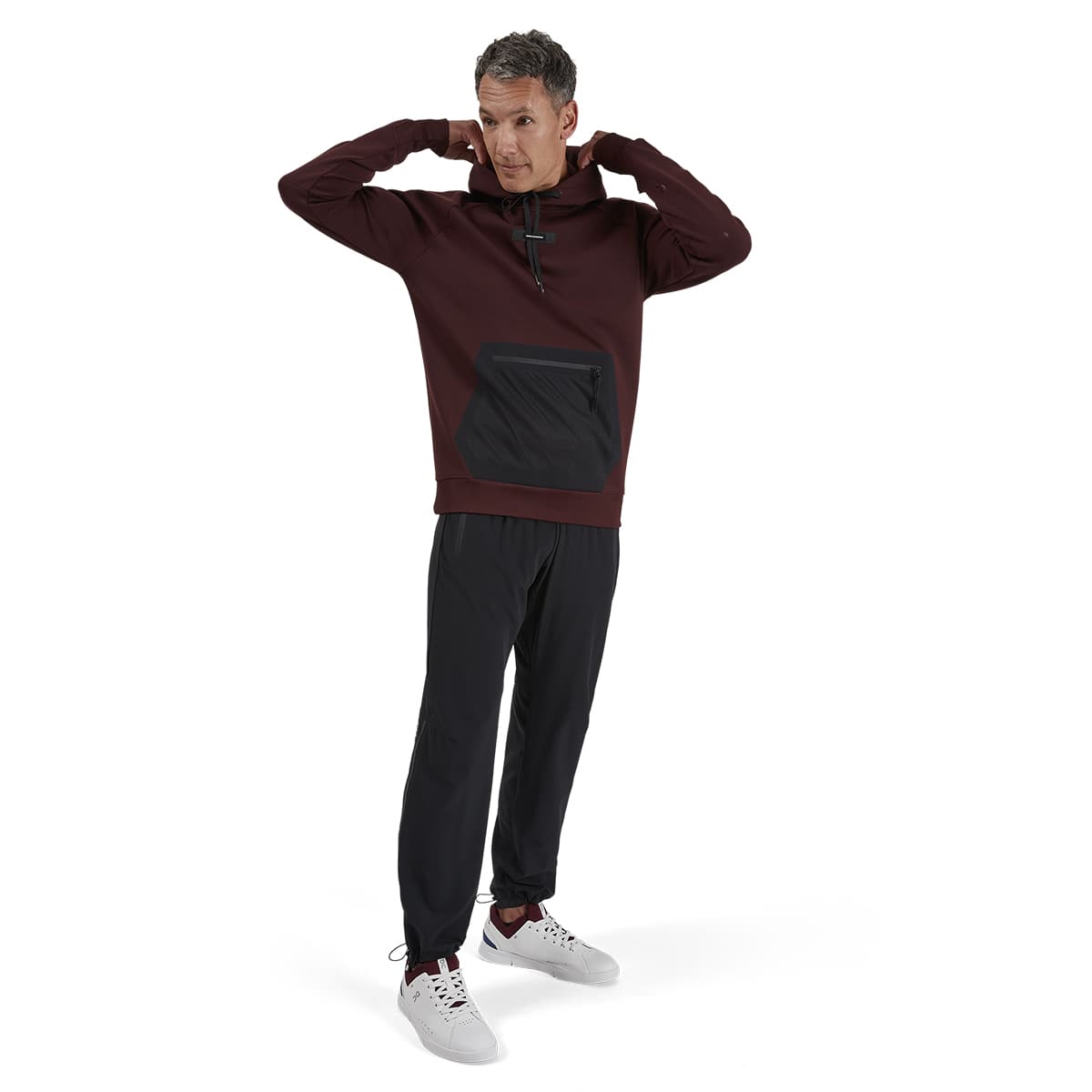Man wearing the On Hoodie Colour Mulberry - Front View 