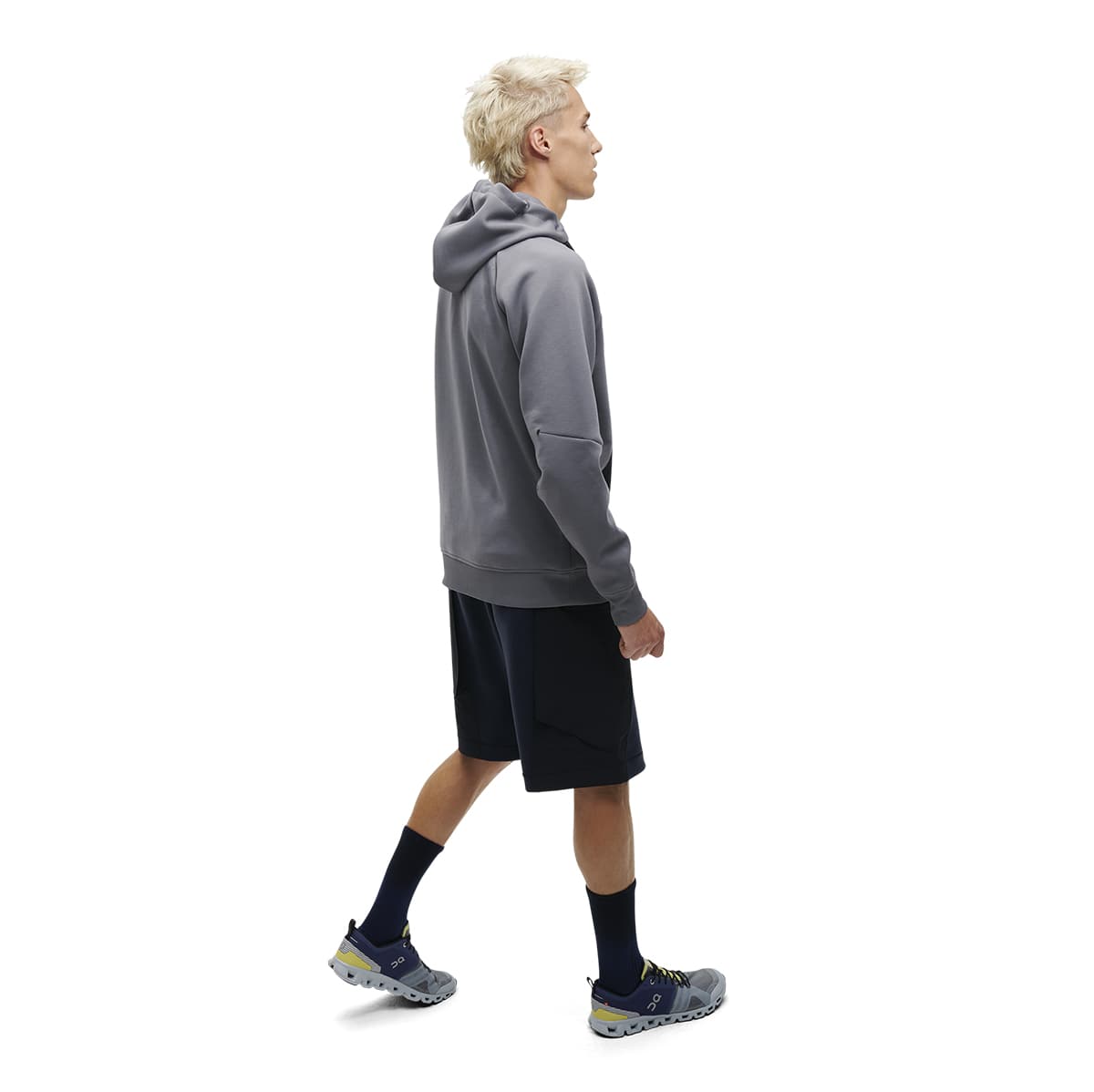 Man wearing the On Hoodie Colour Rock - Side View 
