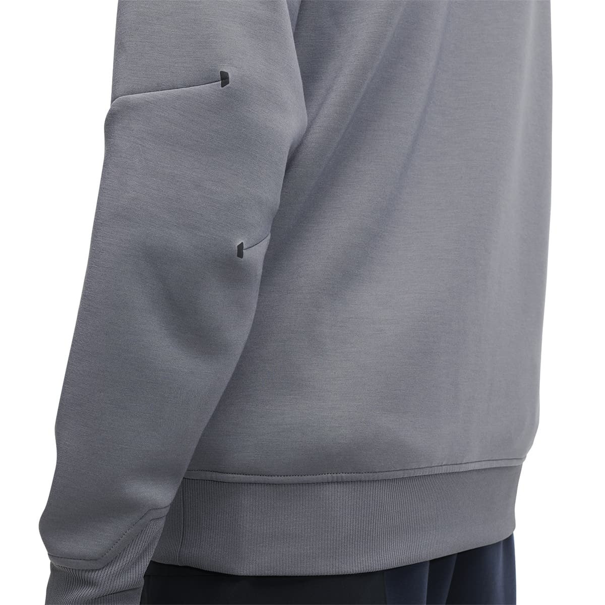 Man wearing the On Hoodie Colour Rock - Arm Detail 