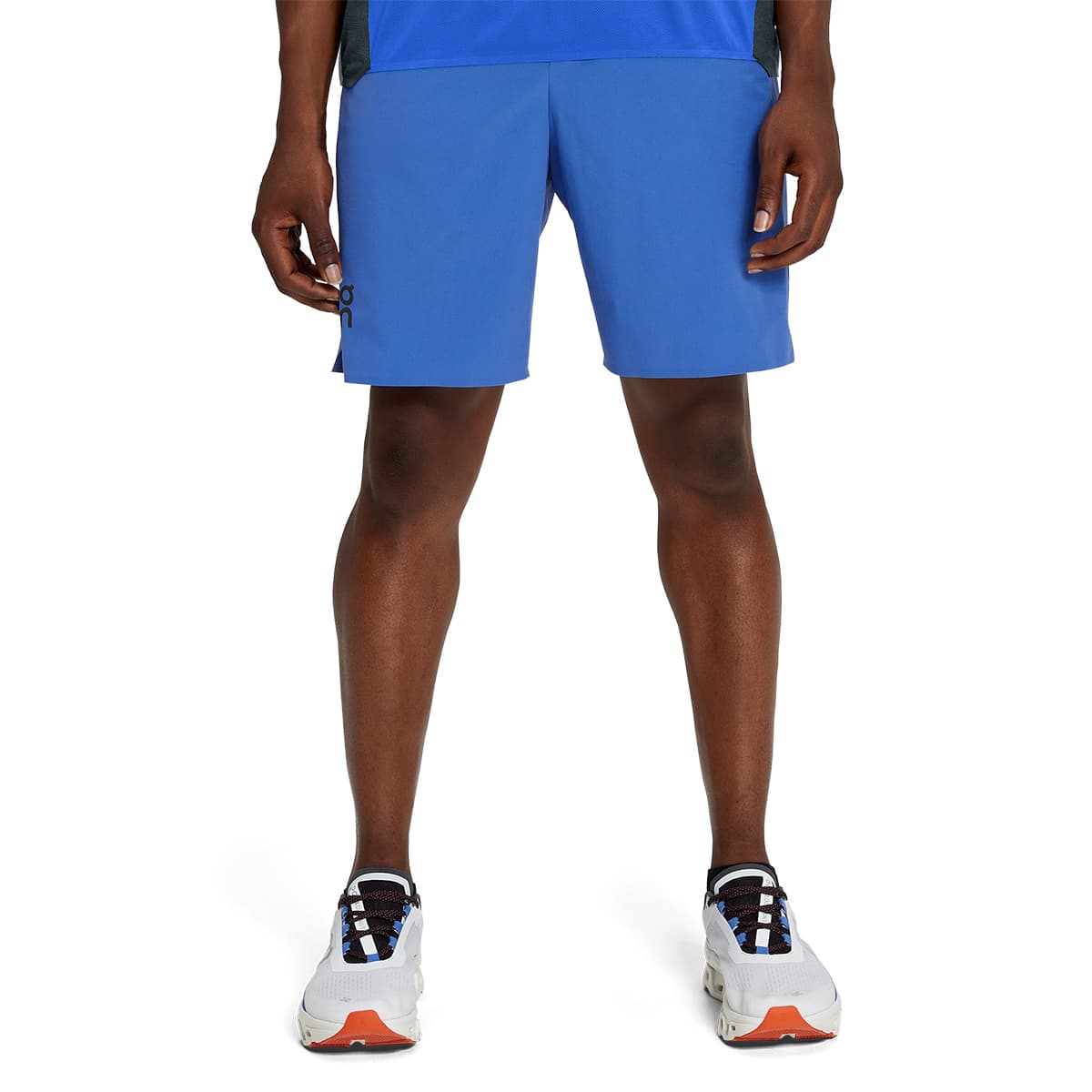 Man wearing the On Hybrid Shorts Colour Cobalt - Front Close Up #color_cobalt