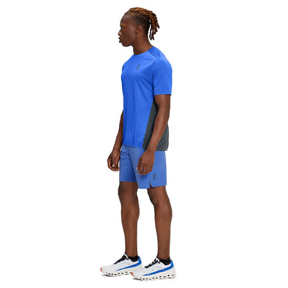 Man wearing the On Hybrid Shorts Colour Cobalt - Side Profile 